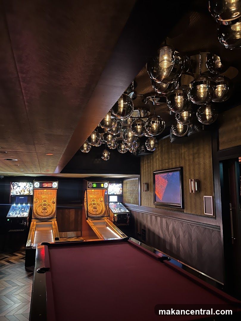 Game Room with Pool Table and Arcade Games