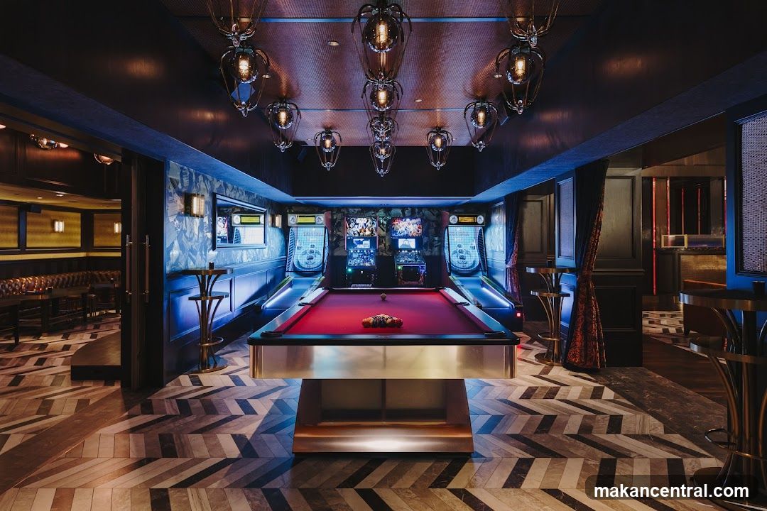 Game Room with Pool Table and Arcade Games
