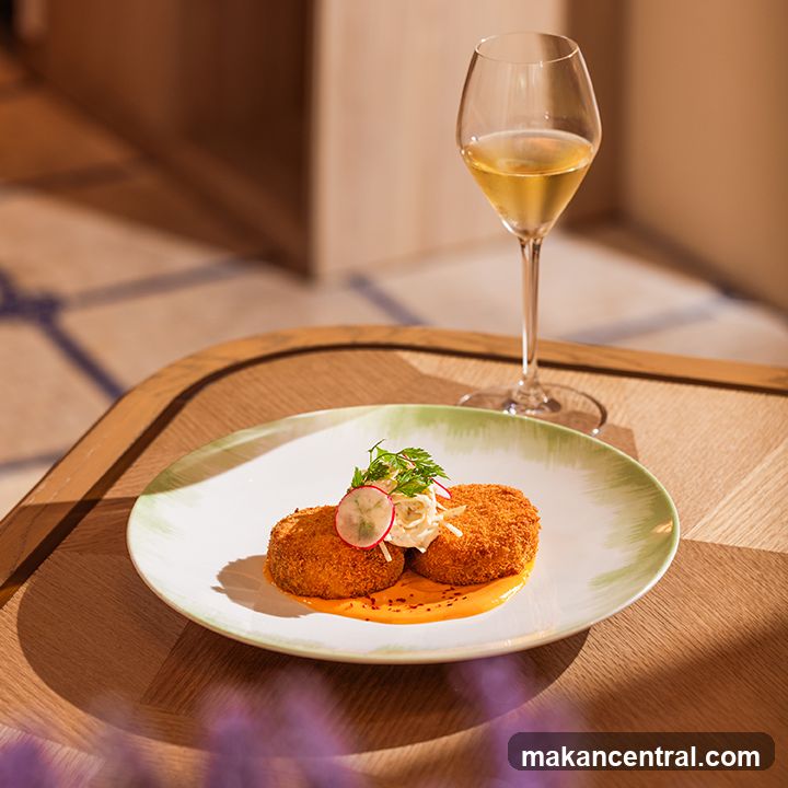 Crab cakes with a glass of white wine