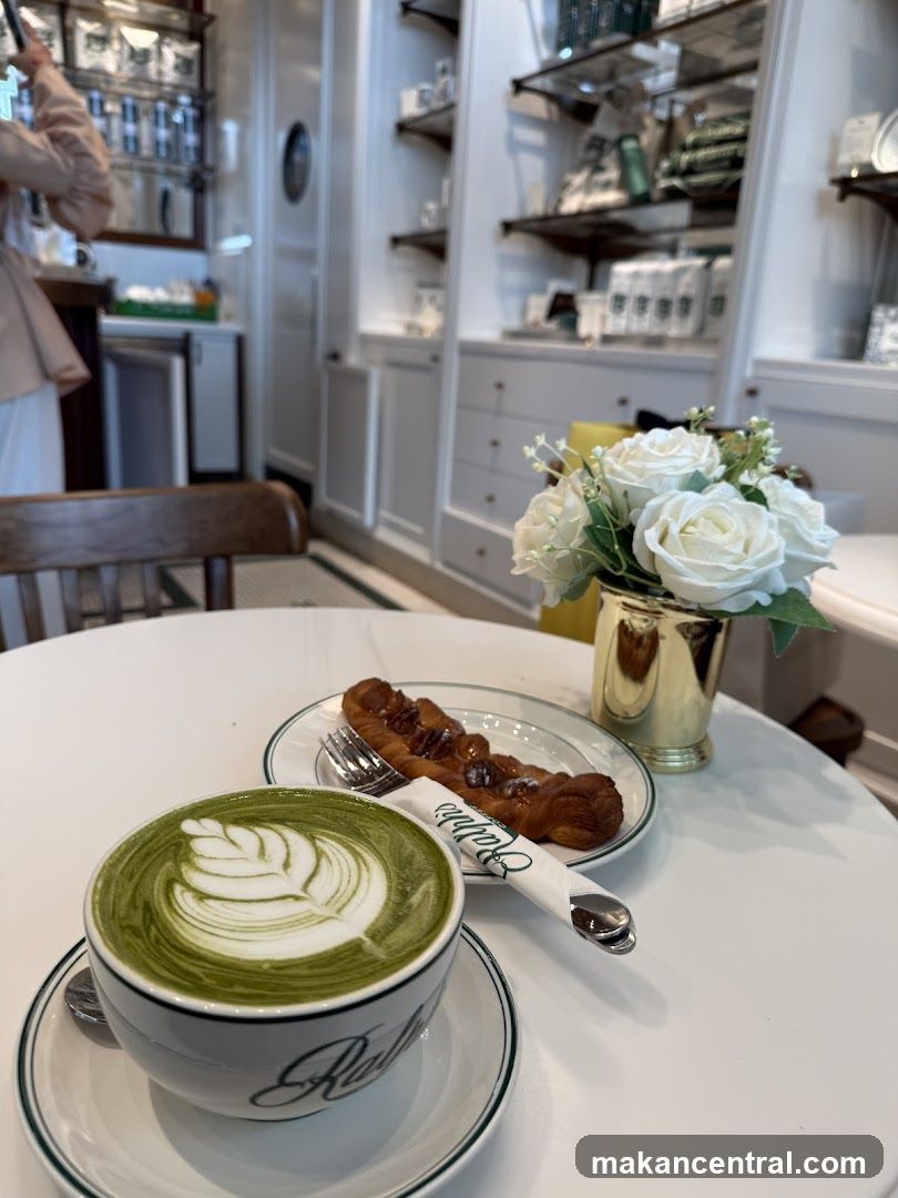 Matcha latte and pastry at a cafe