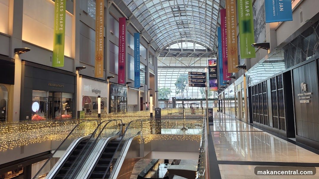 Indoor Shopping Mall with Escalators and Banners