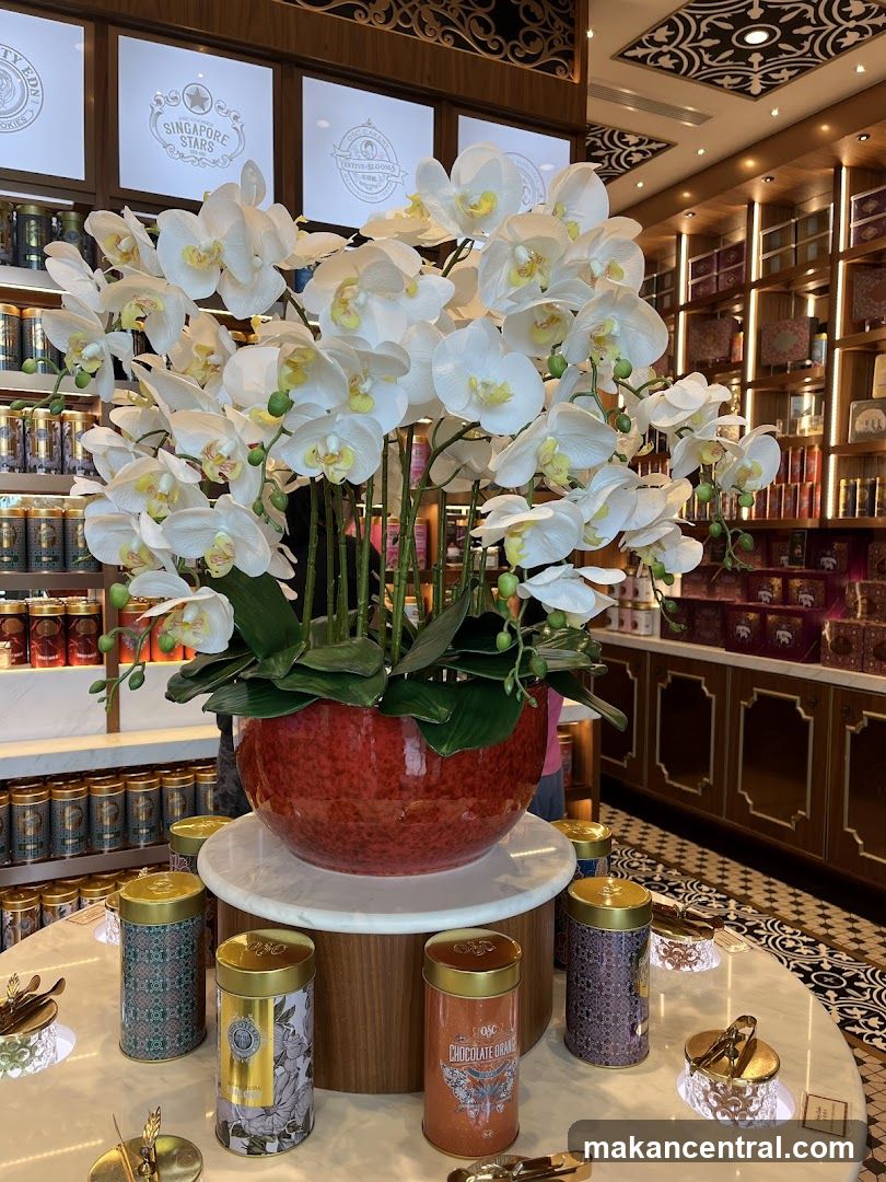 Orchid Arrangement and Gift Tins