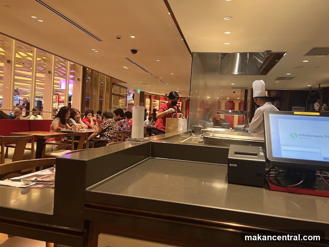 Restaurant Interior with Chefs and Diners
