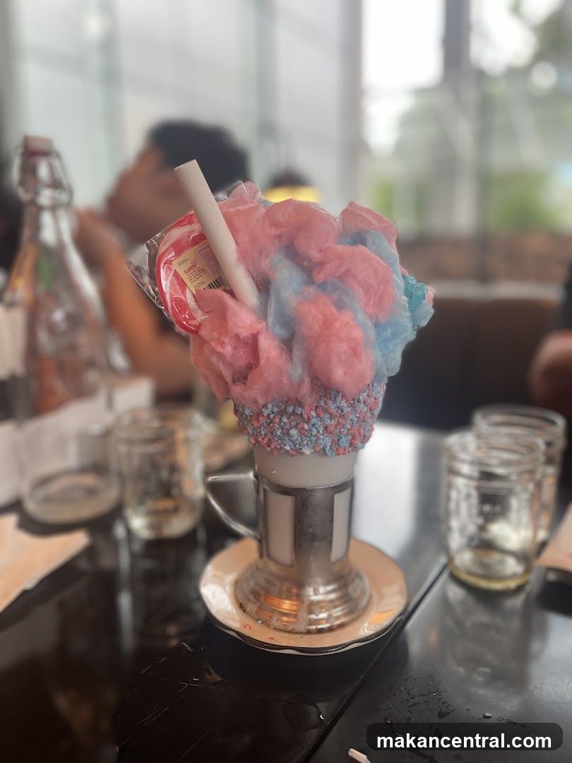 Dessert with Cotton Candy and Lollipop