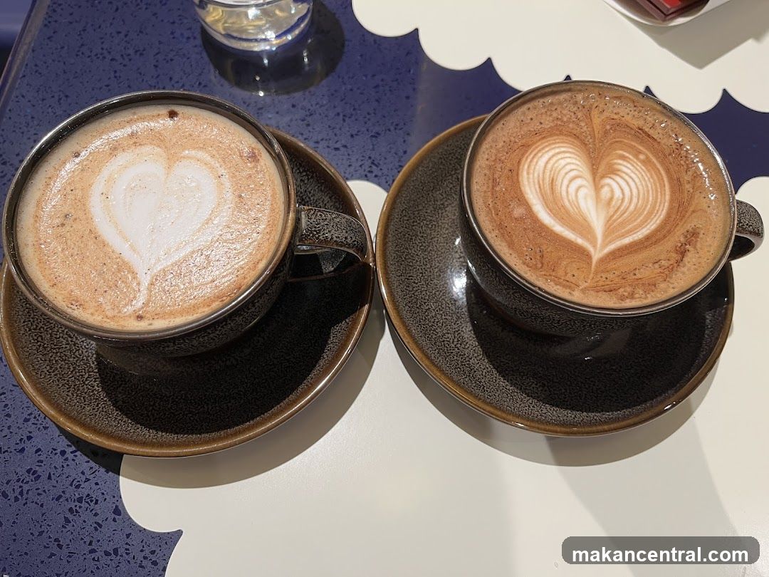 Two coffees with latte art