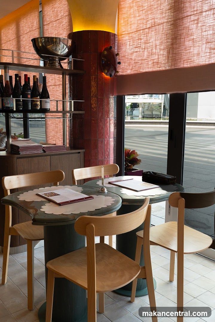 Restaurant Interior with Tables and Wine Bottles