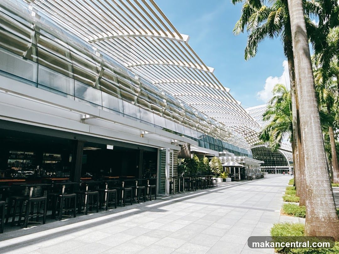 Outdoor seating area with palm trees