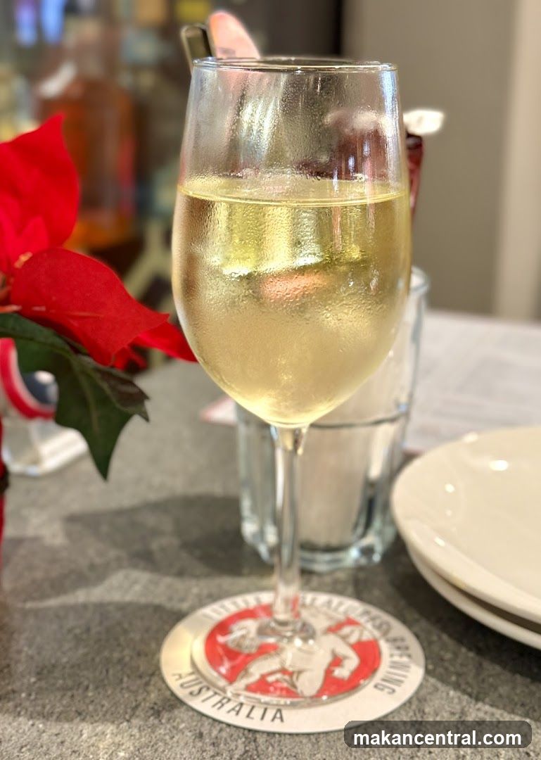 Glass of White Wine on Coaster