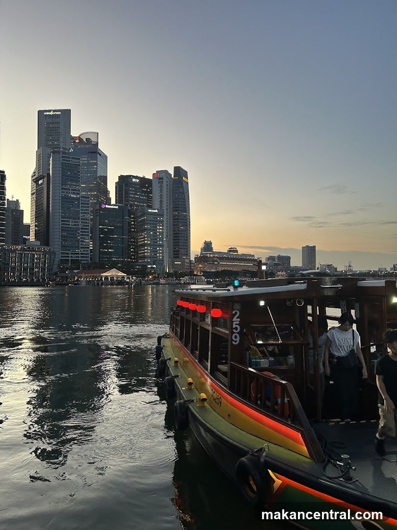 Boat on Water with City Skyline