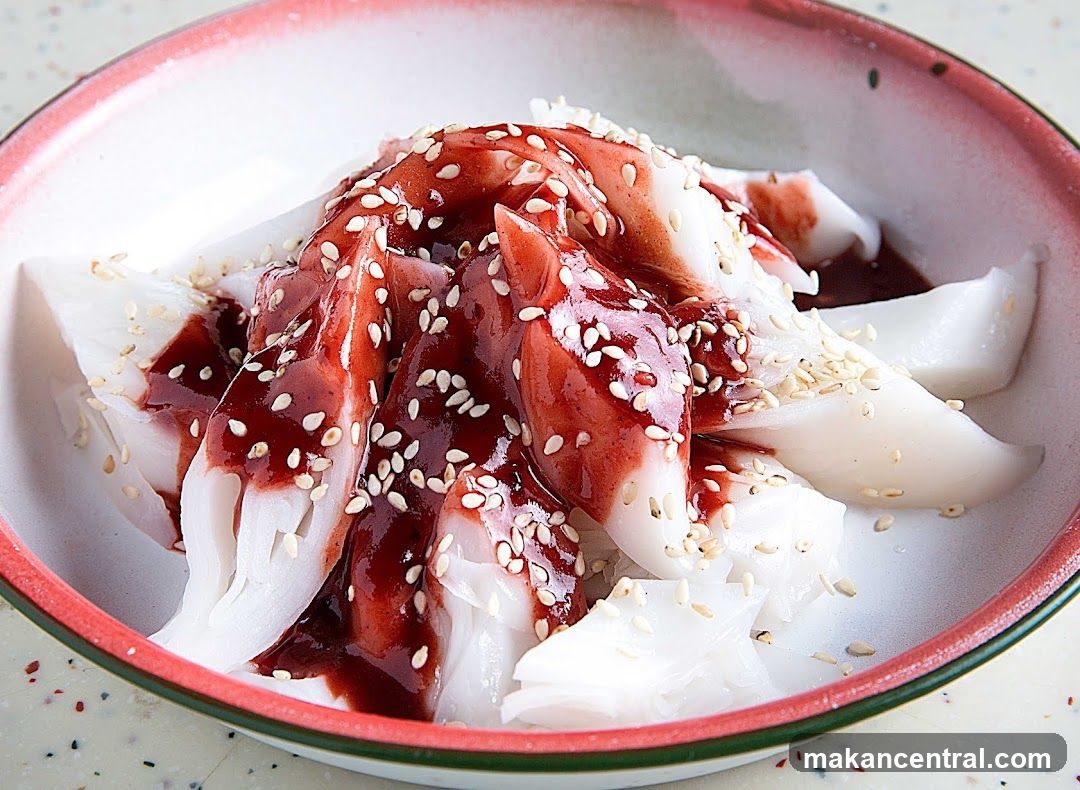 Rice Noodle Rolls with Sauce and Sesame Seeds