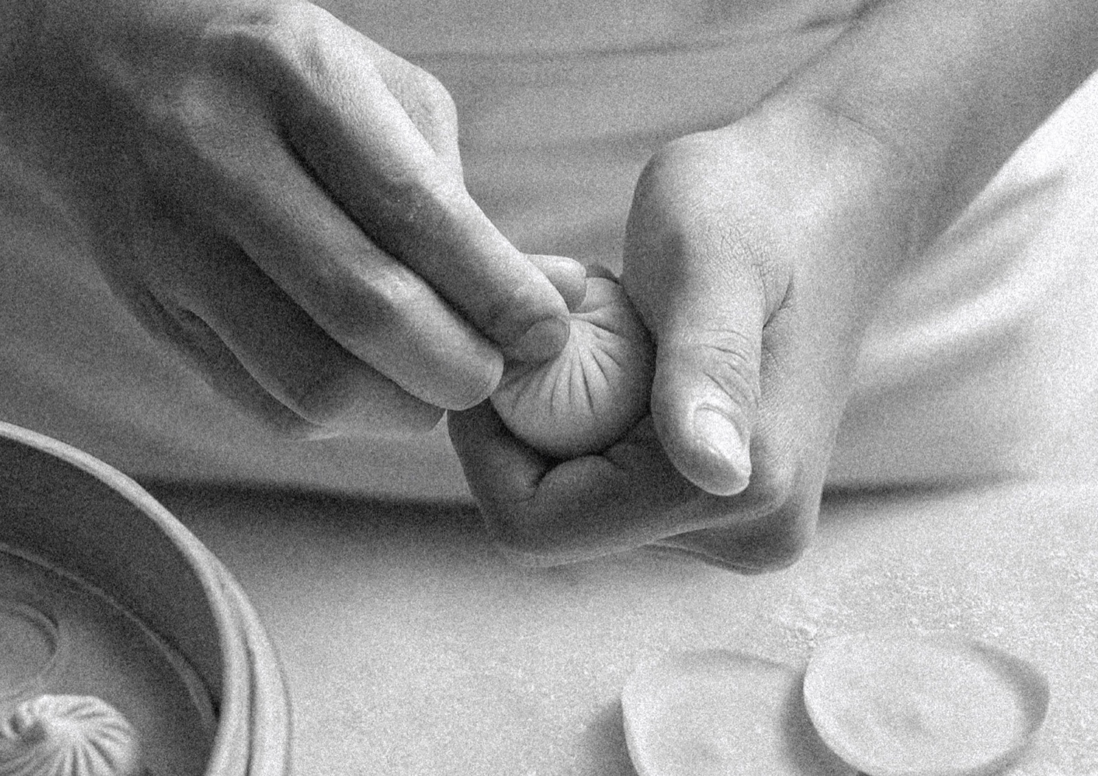 Cook folding xiao long bao, the craft Din Tai Fung still uses at ION Orchard