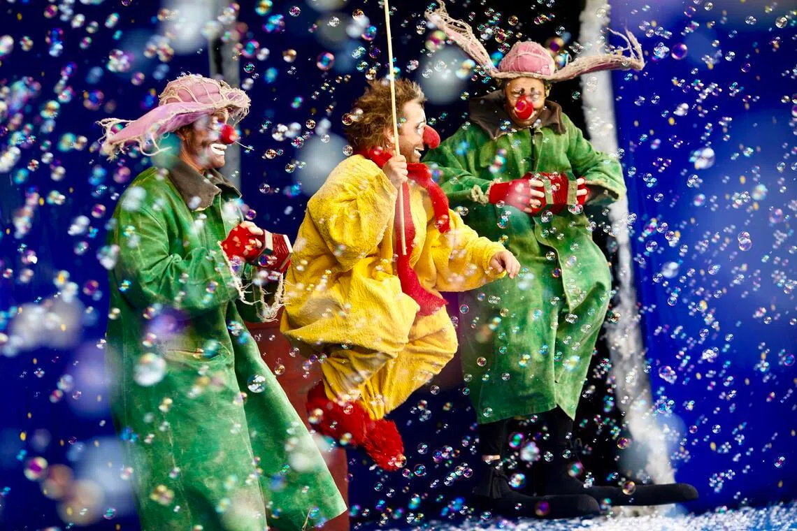 Clowns performing during Slava's Snowshow snowstorm finale at Marina Bay Sands